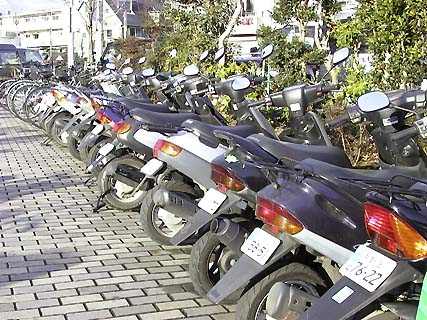 Scooters in the bike parking area