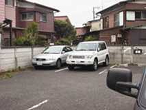Houses across a parking lot